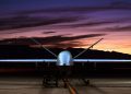 military drone with sunset in background